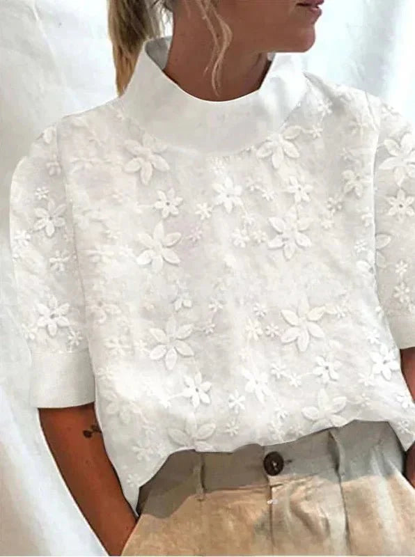 Nora | Broderad blus med ståkrage